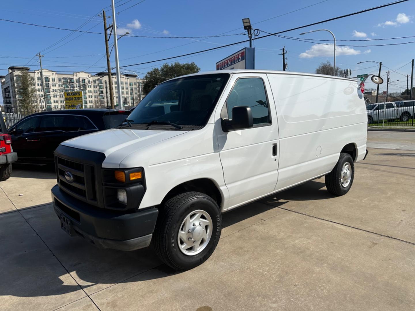 2011 White /Gray Ford E-Series Van (1FTNE2EWXBD) with an 4.6L engine, Automatic transmission, located at 1501 West 15th St., Houston, 77008, (713) 869-2925, 29.797941, -95.411789 - Photo#0